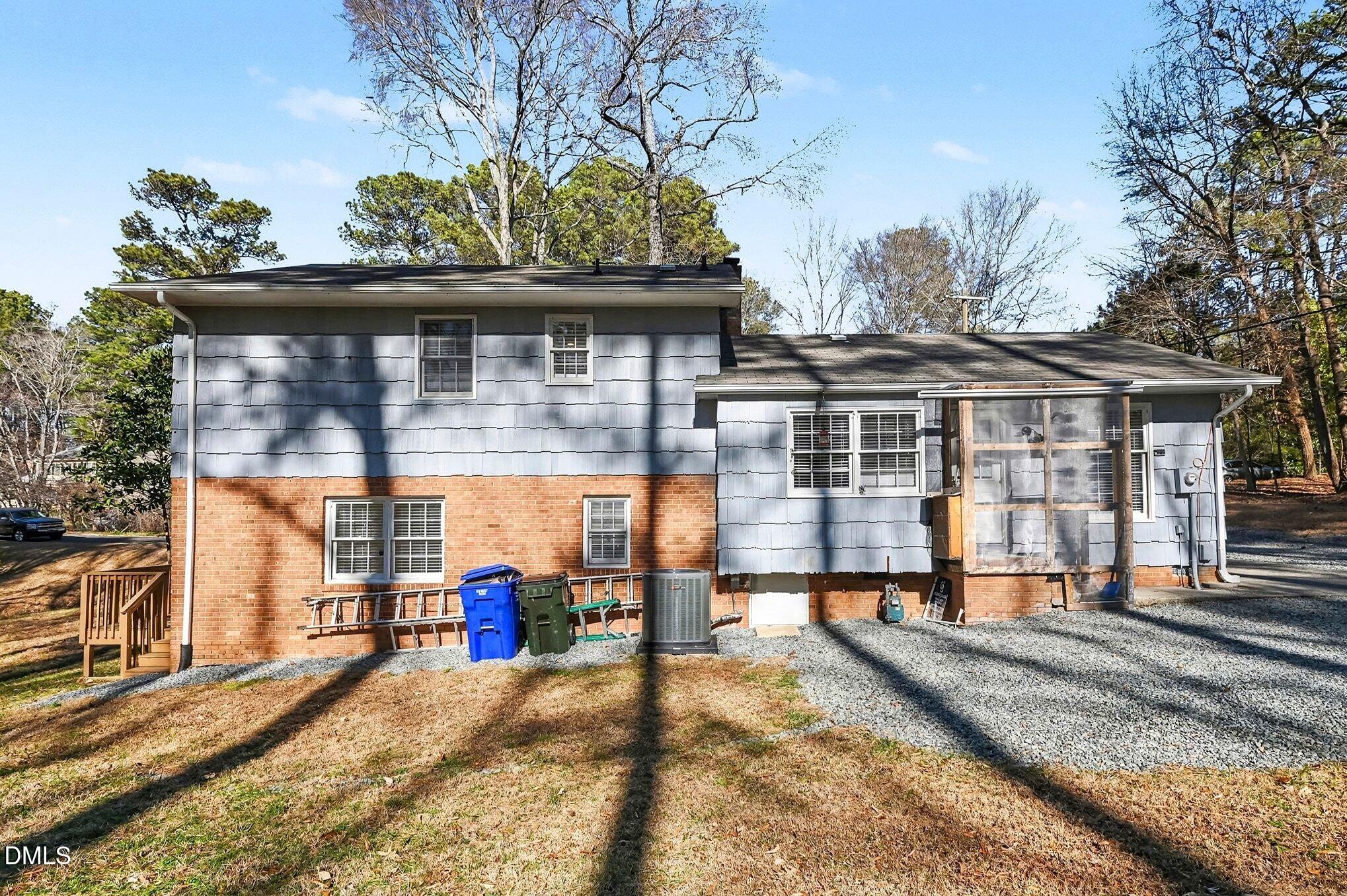1920 White Plains Road Chapel Hill, NC 27517 - Photo 24 of 31 a view of a house with a backyard