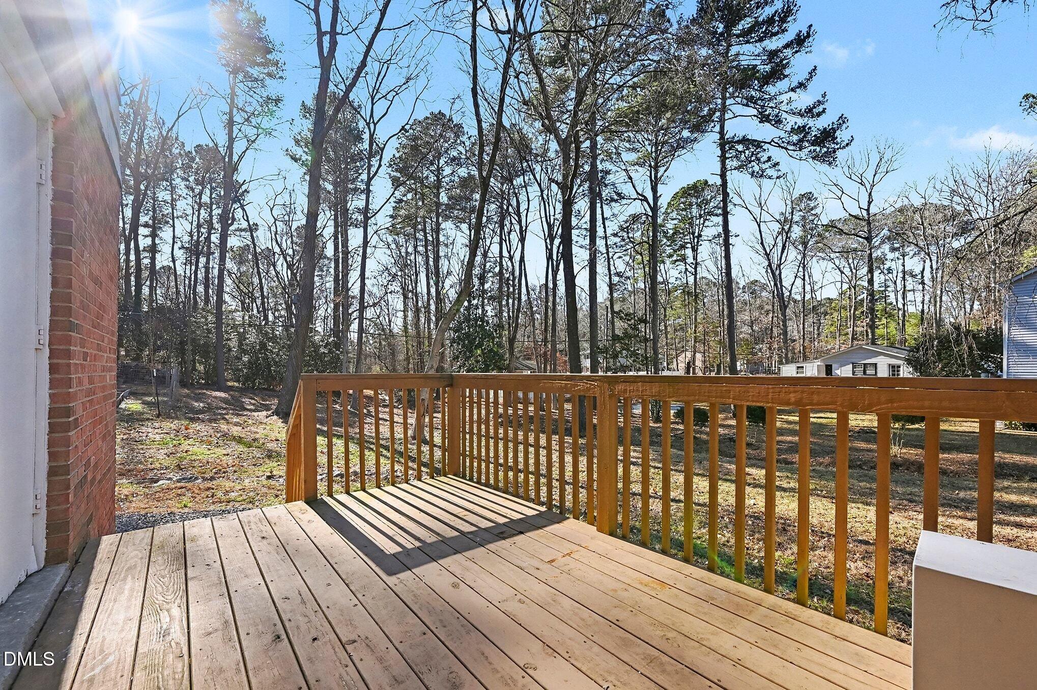 1920 White Plains Road Chapel Hill, NC 27517 - Photo 27 of 31 a view of balcony with wooden floor and fence