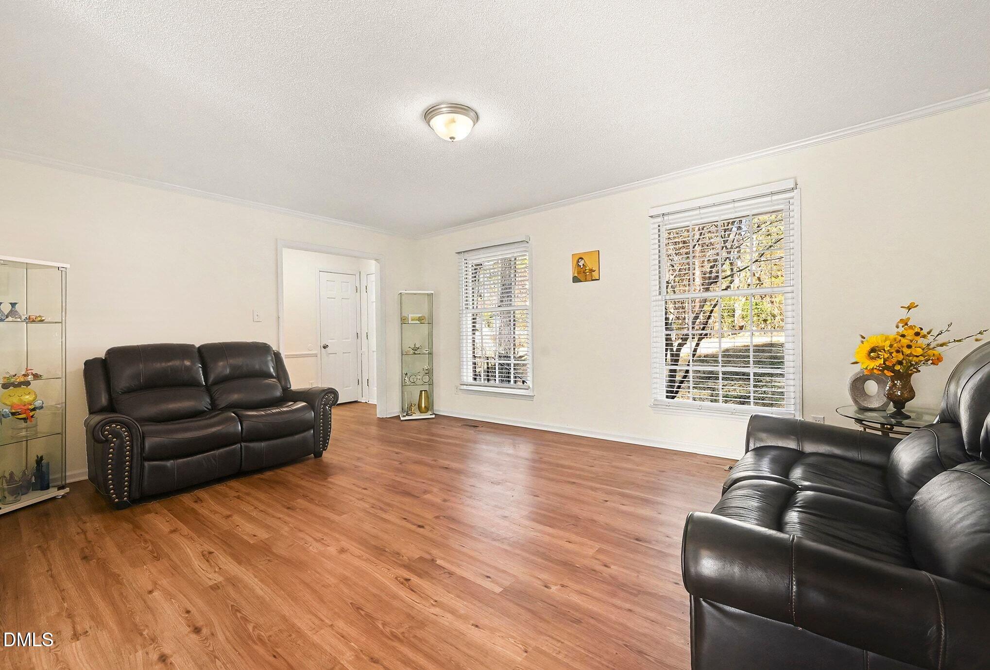 1920 White Plains Road Chapel Hill, NC 27517 - Photo 6 of 31 a living room with furniture and a window