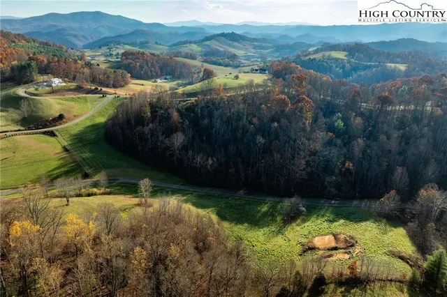 a view of residential houses with outdoor space