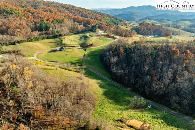 a view of an ocean from a mountain