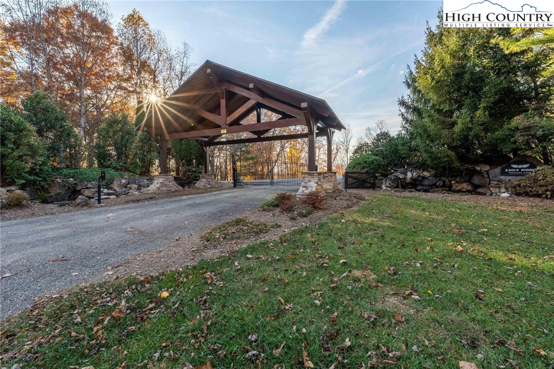 Lot 18 Silver Oak Road Butler, TN 37640 - Photo 41 of 42 a view of a big house with a big yard and large trees