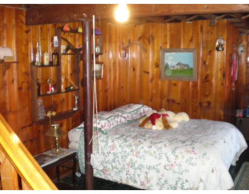 39 Long Hill Road Holland, MA 01521 - Photo 15 of 22 a bedroom with a bed and a shower