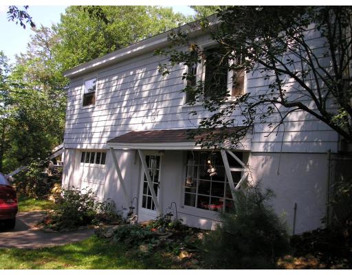 39 Long Hill Road Holland, MA 01521 - Photo 4 of 22 a front view of a house with a yard