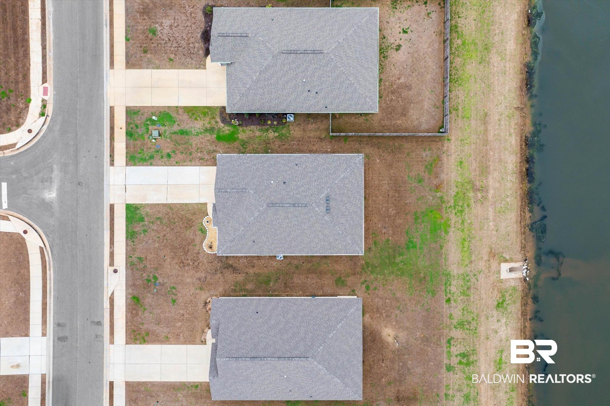 17041 Muse Street Loxley, AL 36551 - Photo 32 of 44 Aerial view of a nearby body of water