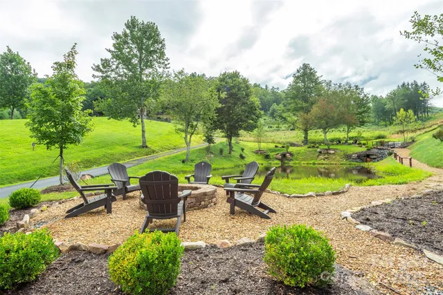 an aerial view of a garden with an outdoor seating