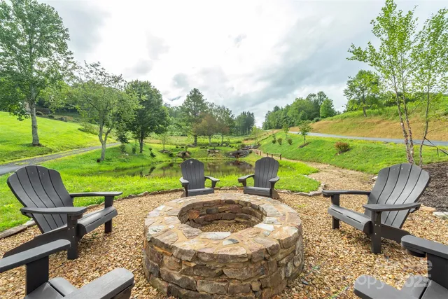 an outdoor space with furniture and garden