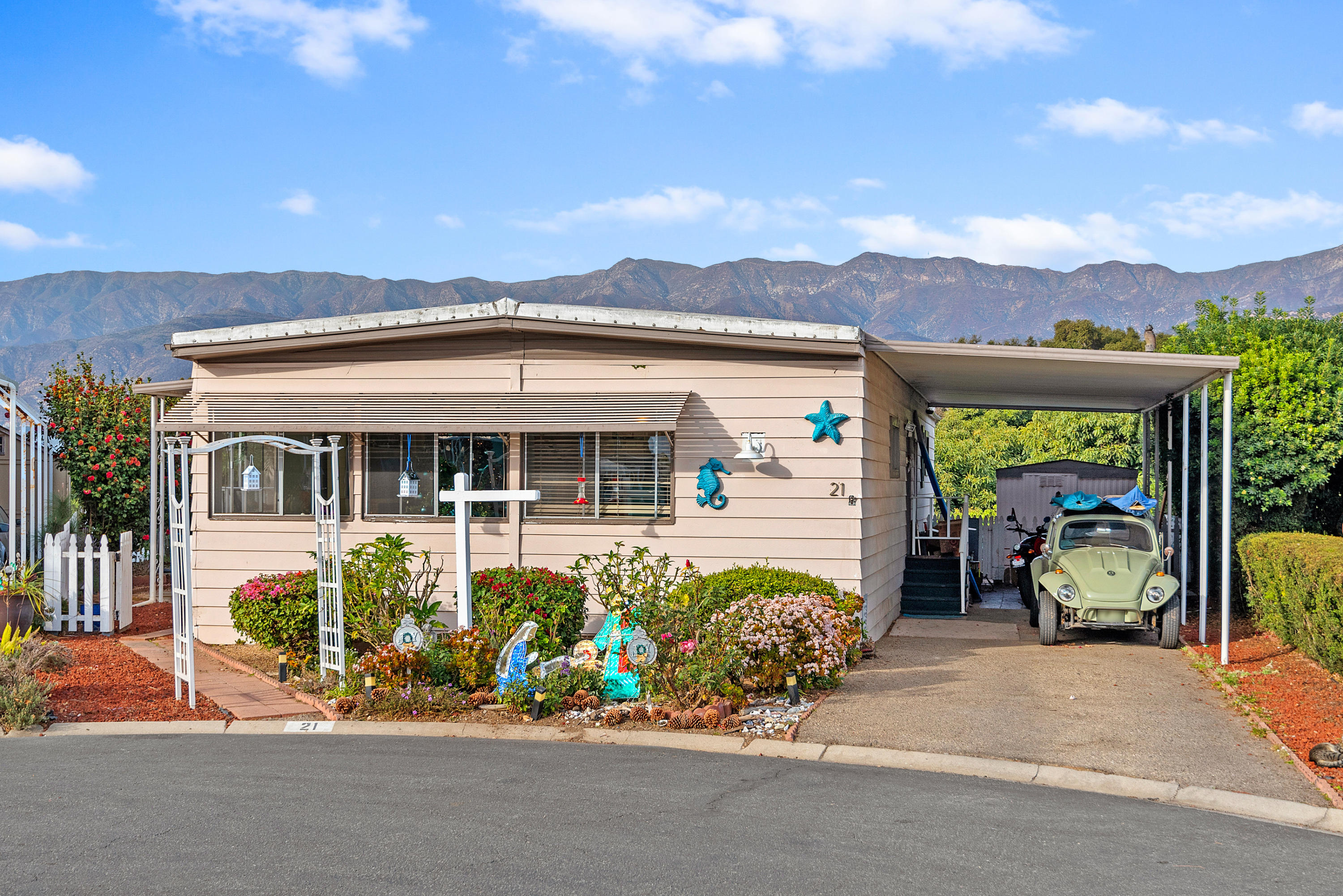 front view of a house with a garden
