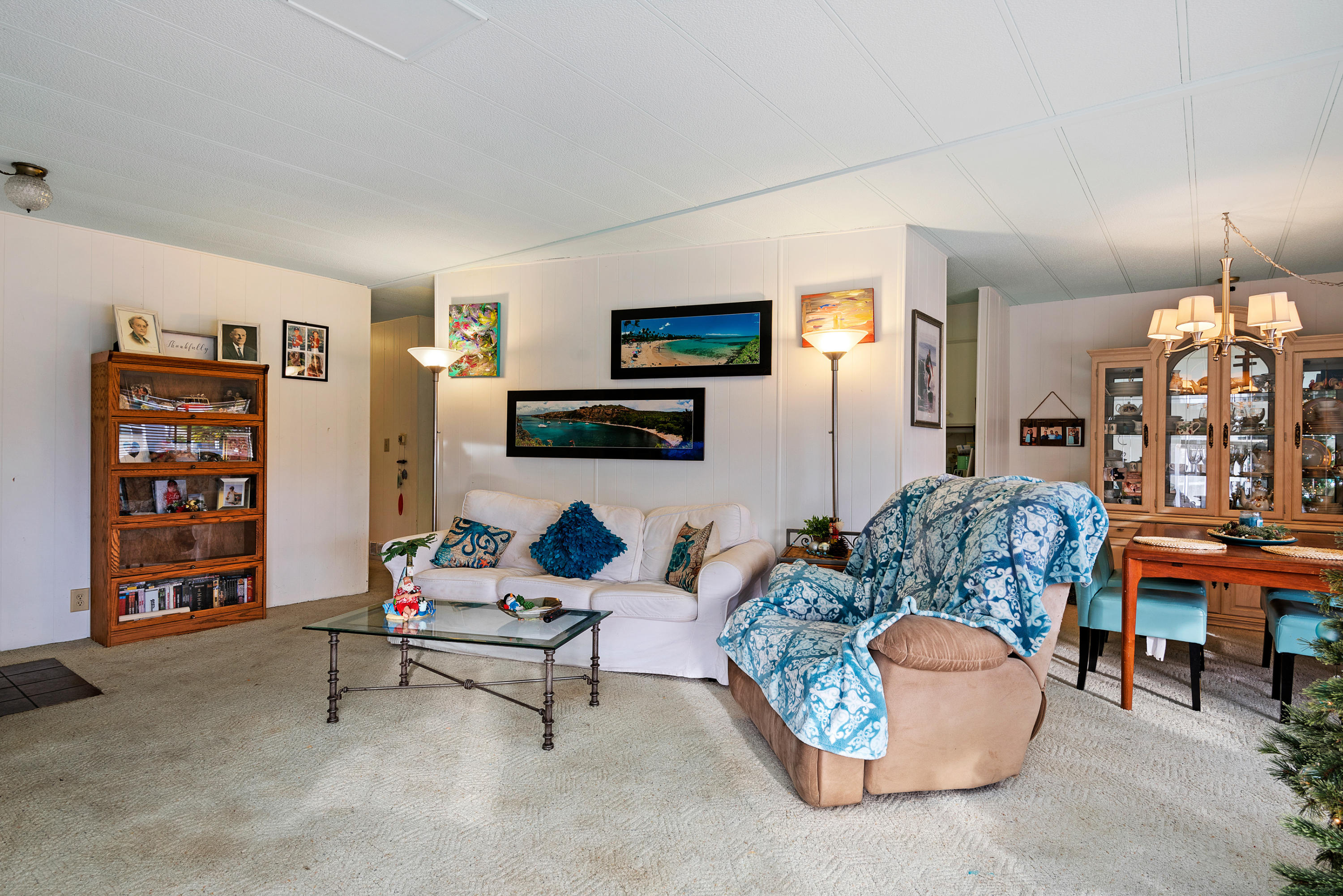 6180 Via Real, Unit 21 Carpinteria, CA 93013 - Photo 4 of 14 a living room with furniture and a flat screen tv