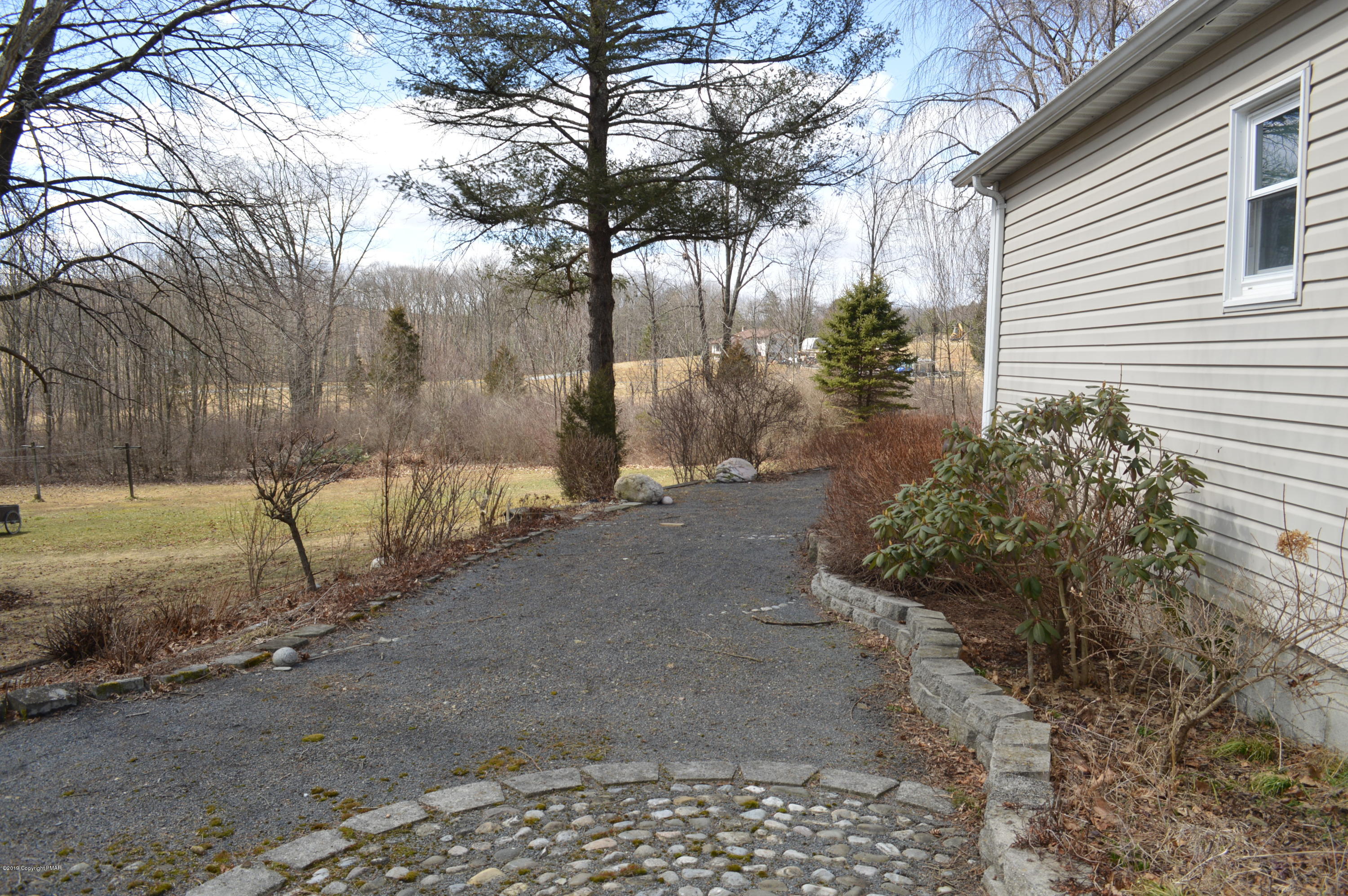 829 Gilbert Road Effort, PA 18330 - Photo 26 of 48 a view of a back yard of the house
