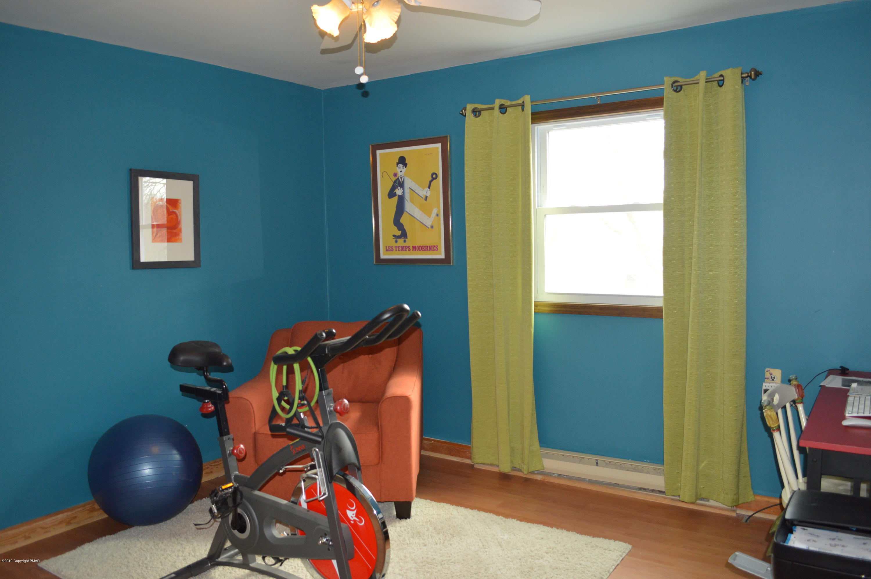 829 Gilbert Road Effort, PA 18330 - Photo 34 of 48 a room with furniture and a window
