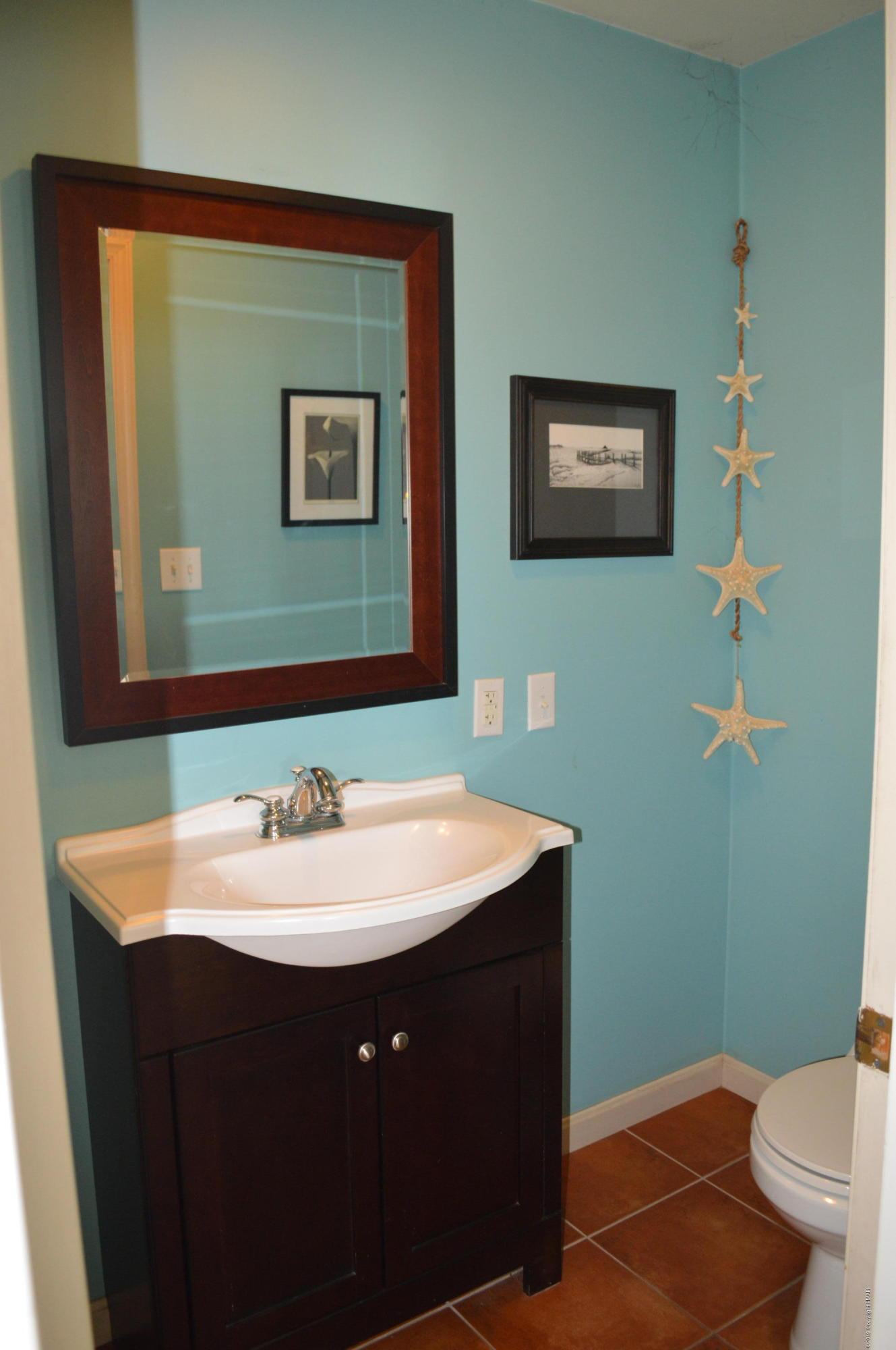829 Gilbert Road Effort, PA 18330 - Photo 40 of 48 a bathroom with a sink and a mirror