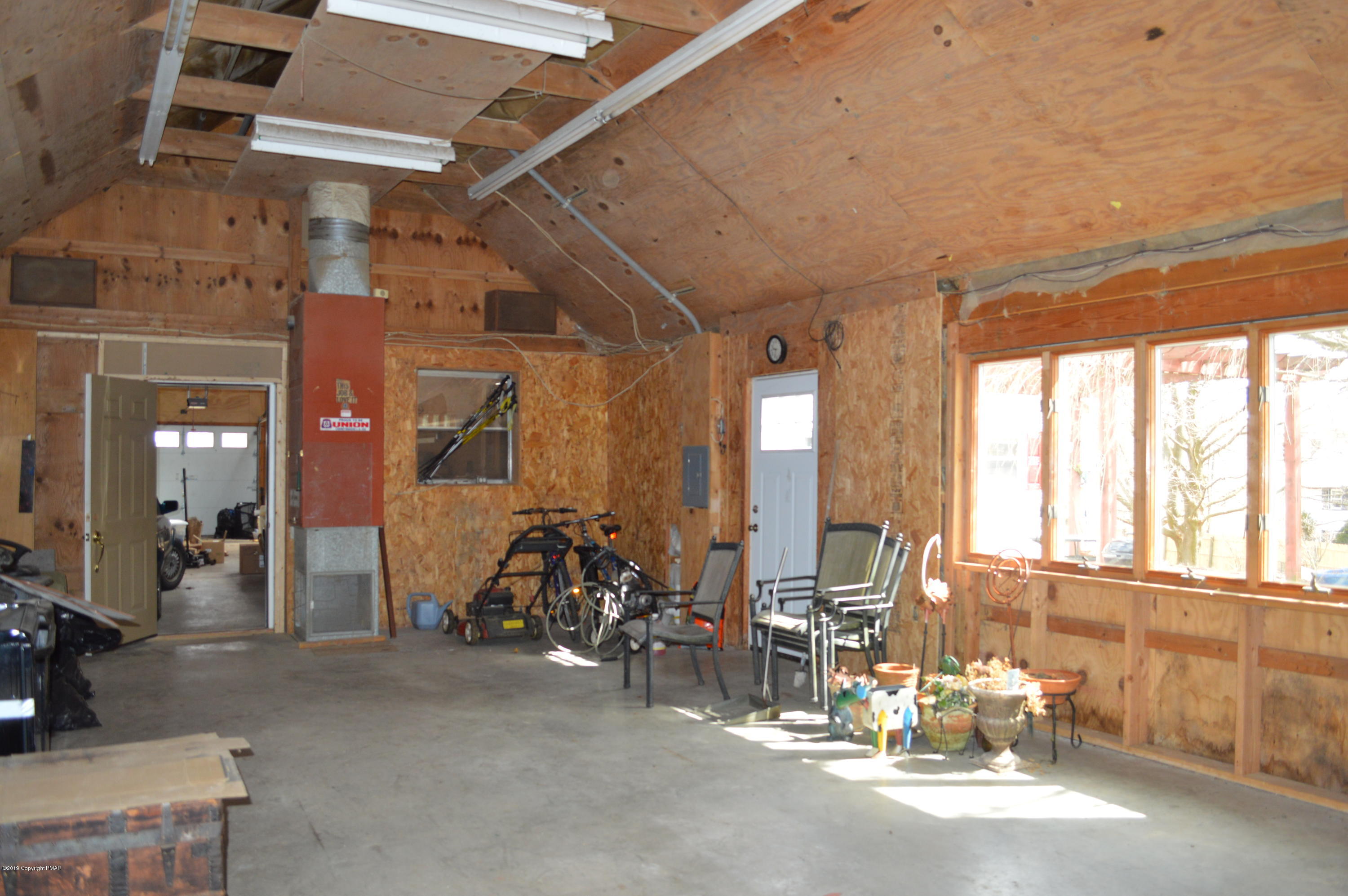 829 Gilbert Road Effort, PA 18330 - Photo 46 of 48 a view of a room with gym equipment