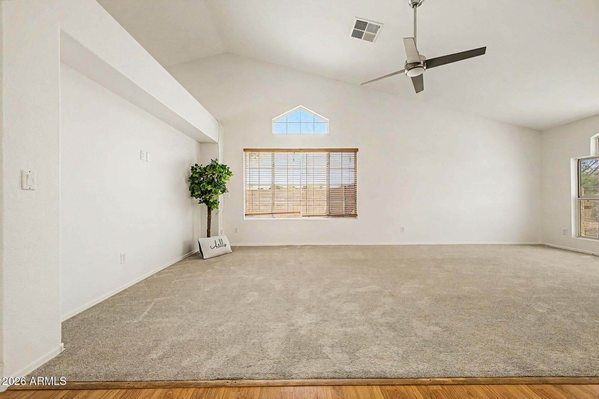 2762 North Ricardo Mesa, AZ 85215 - Photo 8 of 38 an empty room with windows and ceiling fan