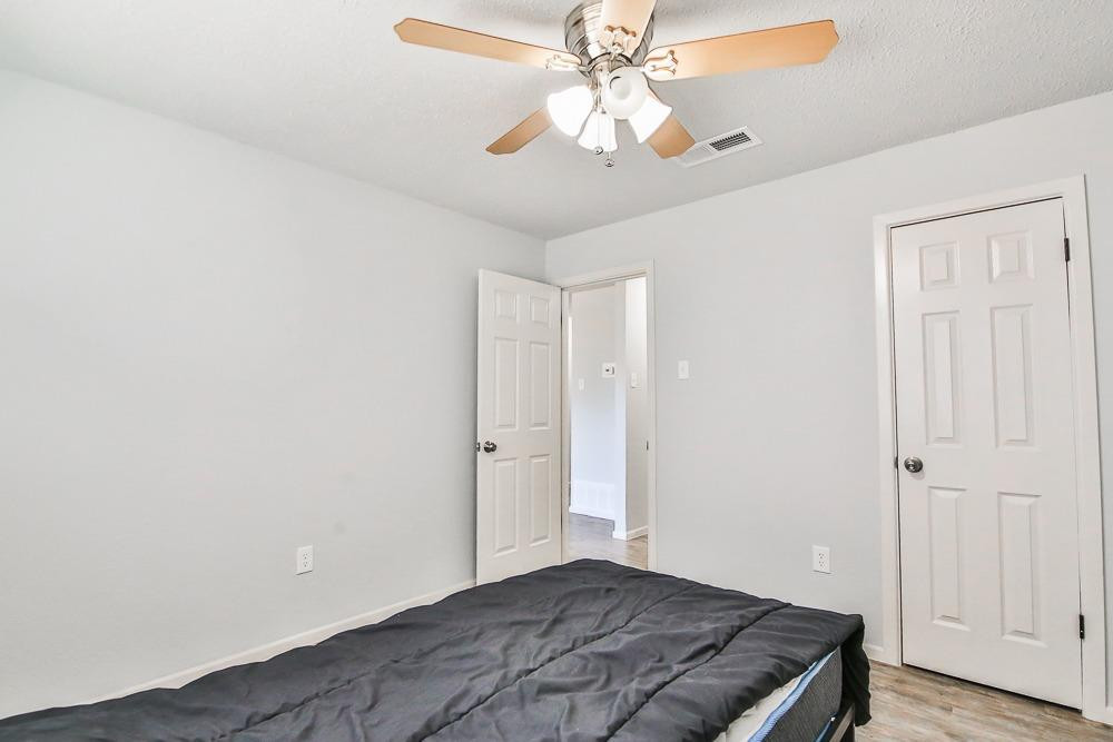 5503 1st Place Lubbock, TX 79416 - Photo 12 of 27 a view of a livingroom with a chandelier fan