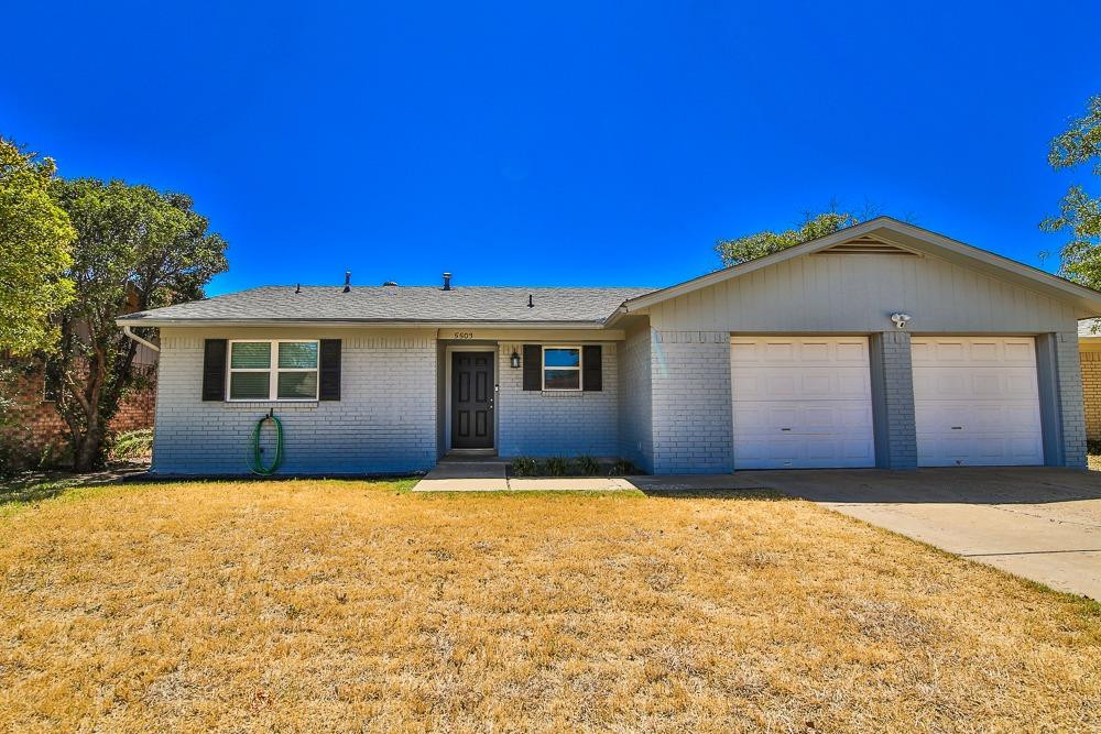 5503 1st Place Lubbock, TX 79416 - Photo 2 of 27 a view of a house with a yard