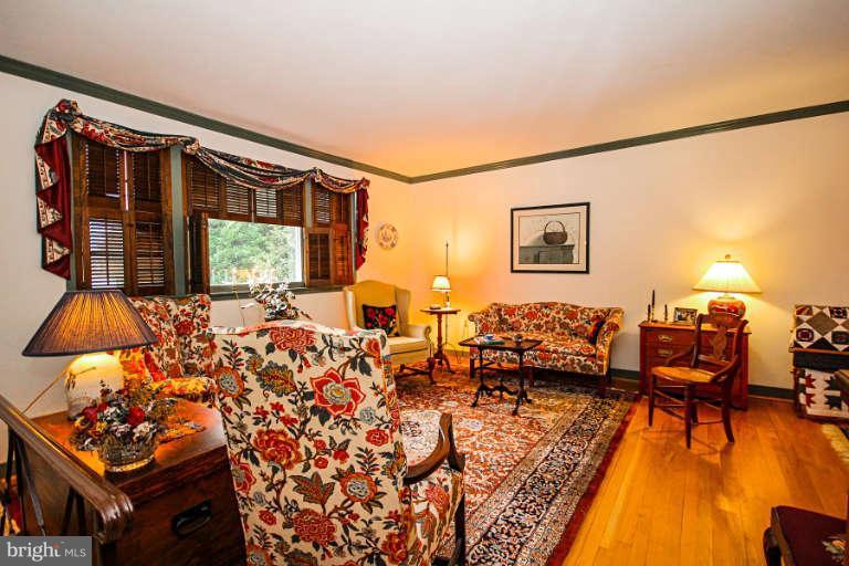 15311 Barnesville Road Boyds, MD 20841 - Photo 7 of 25 a living room with furniture and a large window