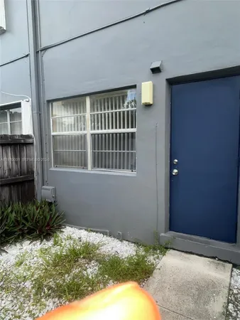 a view of backyard with green space
