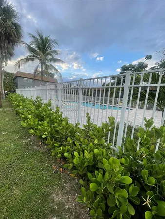 a garden view with a seating space