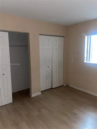 a bathroom with a sink a toilet and bathtub