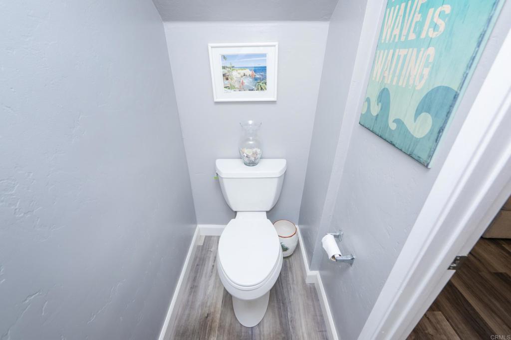 929 Jamacha Road, Unit B El Cajon, CA 92019 - Photo 17 of 36 a white toilet sitting next to a white sink