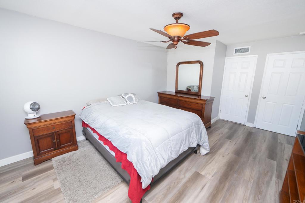 929 Jamacha Road, Unit B El Cajon, CA 92019 - Photo 20 of 36 a bedroom with a bed and a dresser
