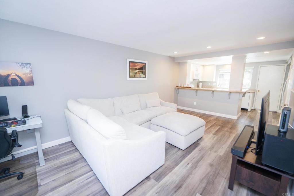 929 Jamacha Road, Unit B El Cajon, CA 92019 - Photo 3 of 36 a living room with furniture and a wooden floor