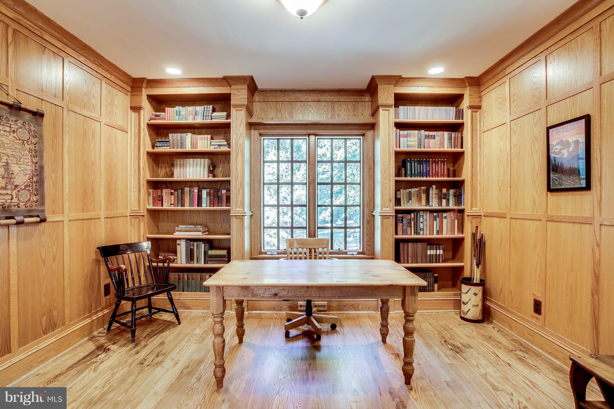 1040 Springvale Road Great Falls, VA 22066 - Photo 4 of 38 Library with paneled walls and built-ins