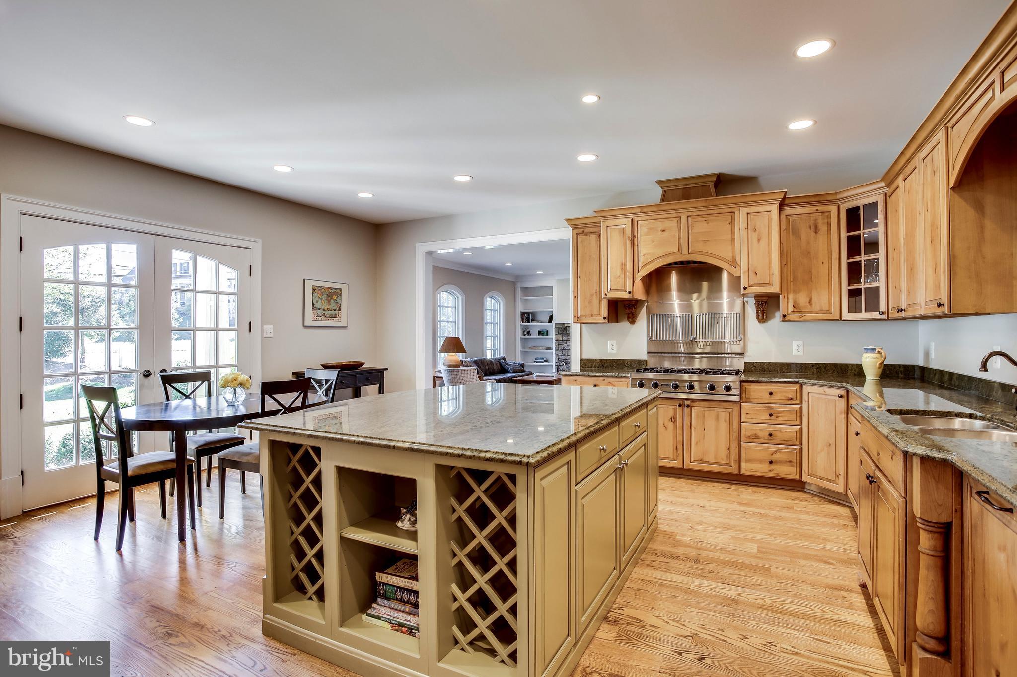 1040 Springvale Road Great Falls, VA 22066 - Photo 7 of 38 Custom cabinetry and center island