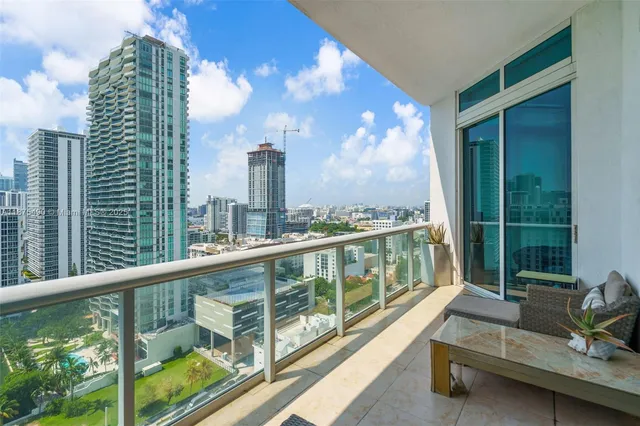a view of a balcony with city view