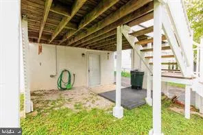 a view of a porch of a house