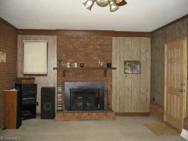 8427 Reid Farm Road Walnut Cove, NC 27052 - Photo 2 of 9 Other. den with FP