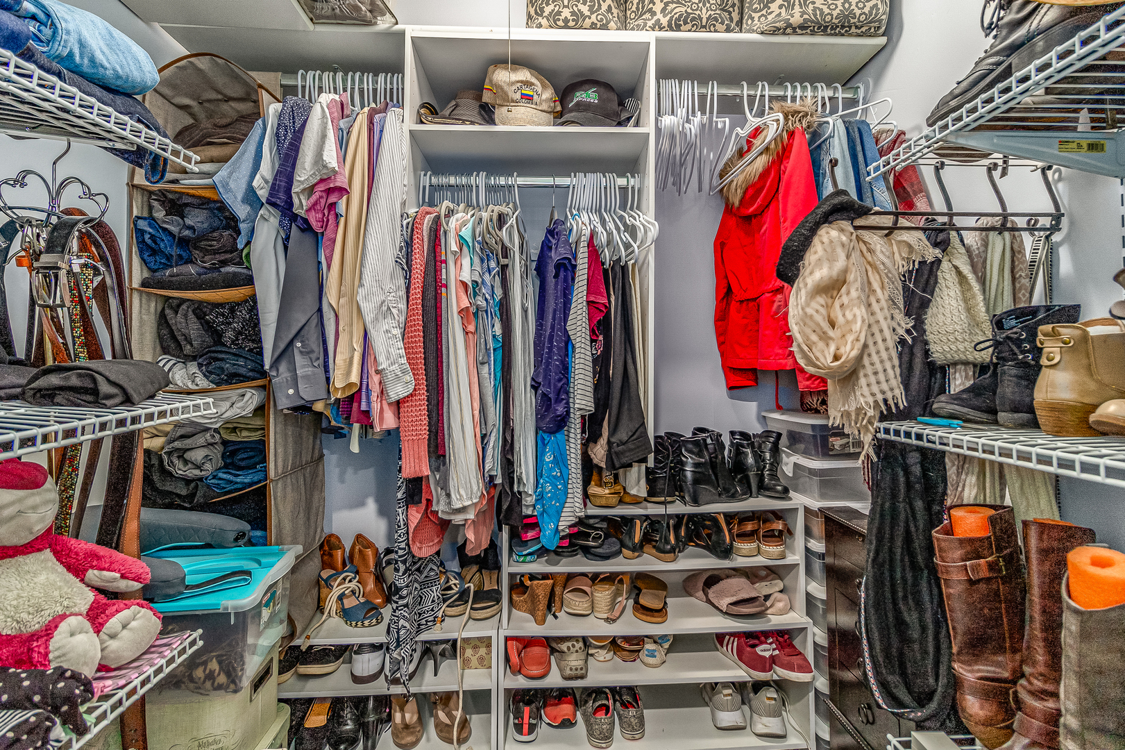 7 Winrock Road Montgomery, IL 60538 - Photo 13 of 24 a view of walk in closet with clothes