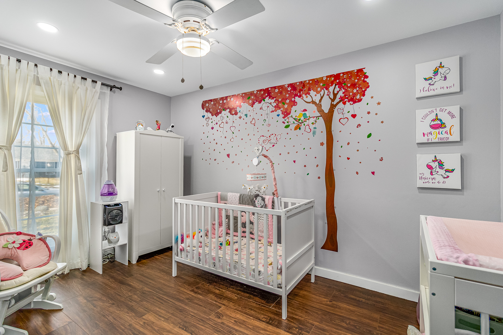 7 Winrock Road Montgomery, IL 60538 - Photo 14 of 24 a bedroom with furniture and wooden floor