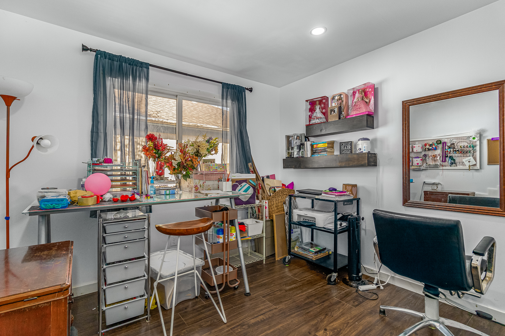 7 Winrock Road Montgomery, IL 60538 - Photo 16 of 24 a view of a workspace with furniture a kitchen and a window