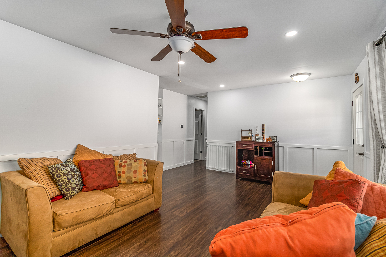 7 Winrock Road Montgomery, IL 60538 - Photo 3 of 24 a living room with furniture and a wooden floor