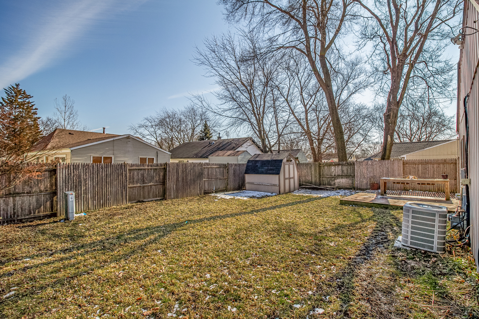 7 Winrock Road Montgomery, IL 60538 - Photo 21 of 24 a view of a house with a large tree in front of it