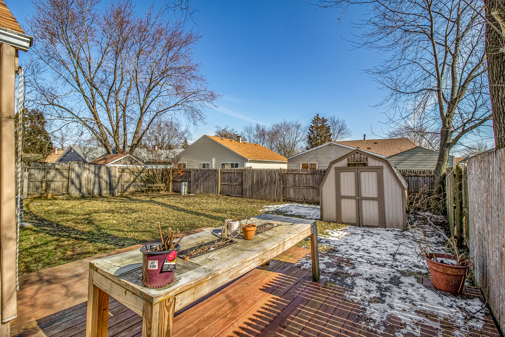 7 Winrock Road Montgomery, IL 60538 - Photo 22 of 24 a view of a white house with a yard