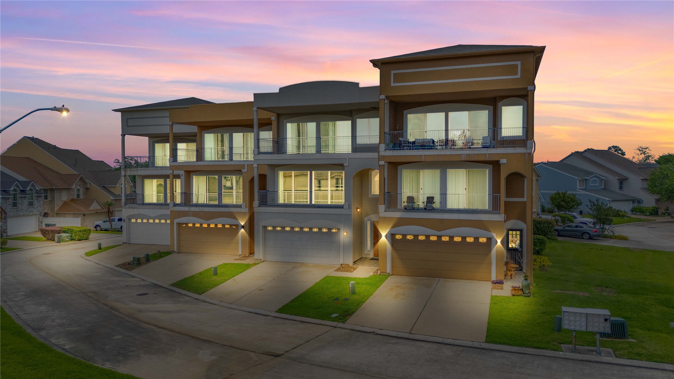 11434 Ketch Court Willis, TX 77318 - Photo 1 of 50 a front view of a residential apartment building with a yard