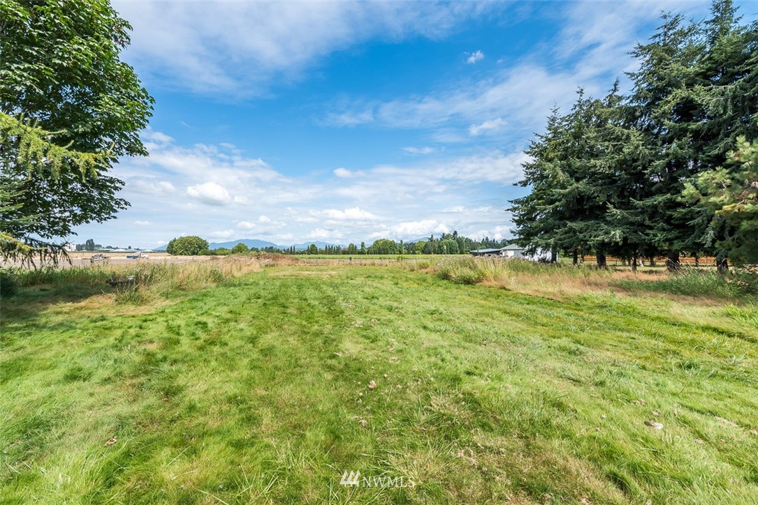 17855 Bennett Road Mount Vernon, WA 98273 - Photo 40 of 40 a view of a lake with houses in the back