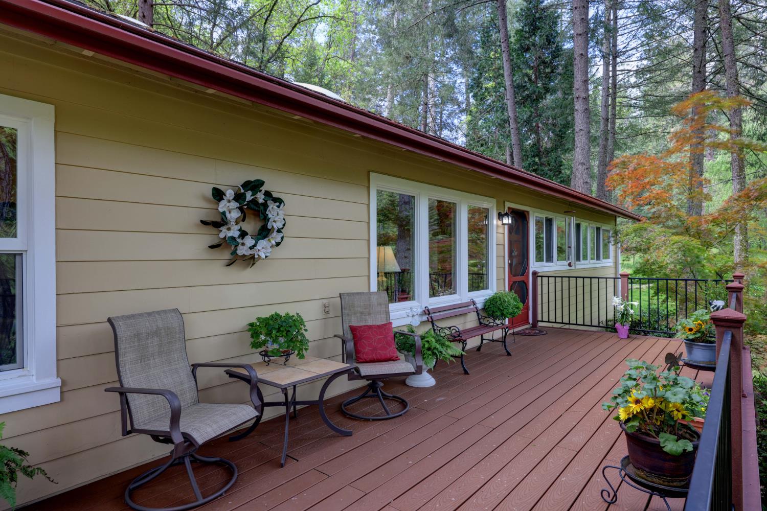 409 Live Oak Road Colfax, CA 95713 - Photo 12 of 74 Front door at end of deck brings you into the living room.