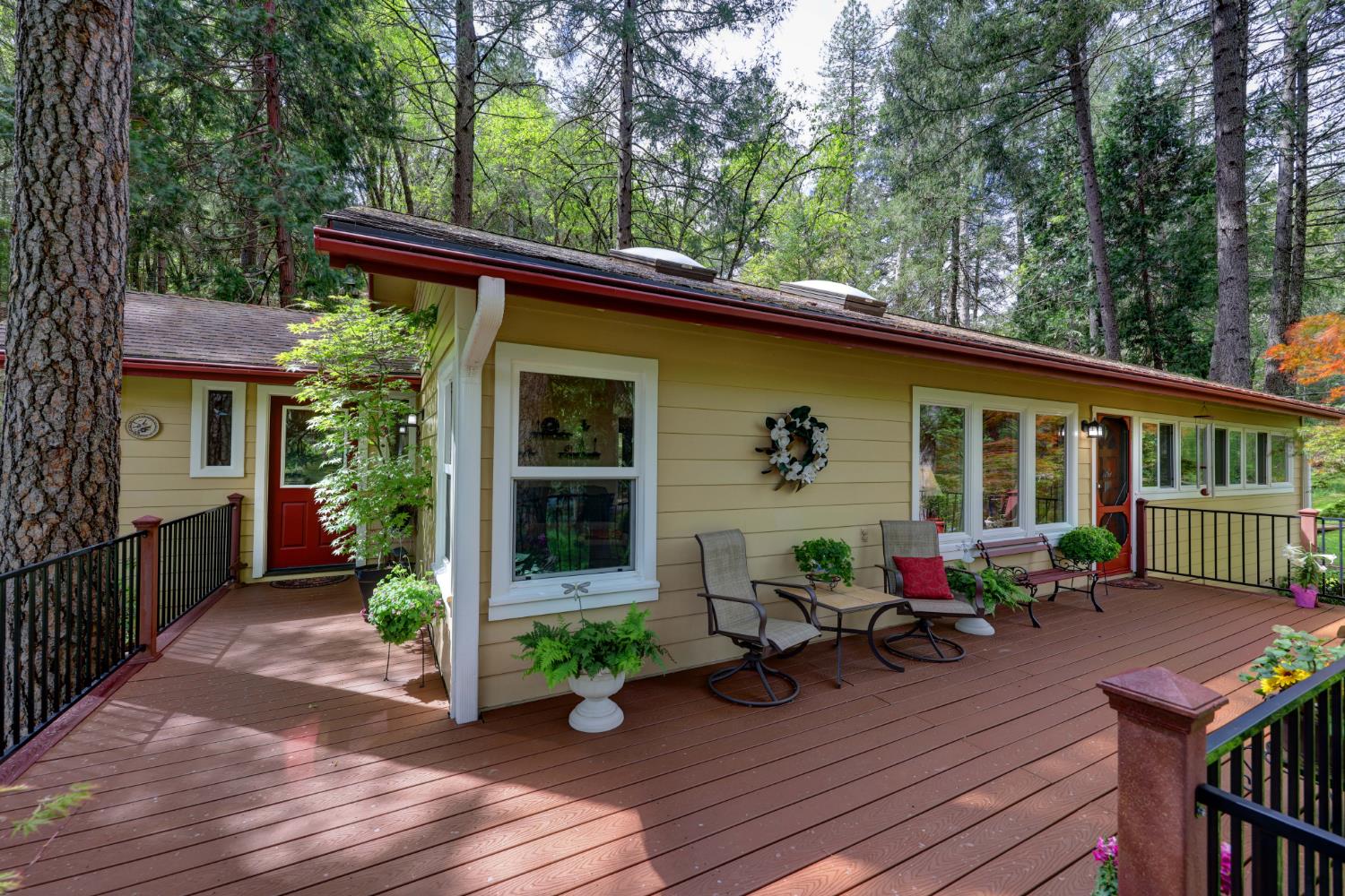 409 Live Oak Road Colfax, CA 95713 - Photo 13 of 74 Side door on right brings you to the perfect spot to hang a coat & leave your shoes and bring in the groceries. It is just off the kitchen and laundry/pantry room.