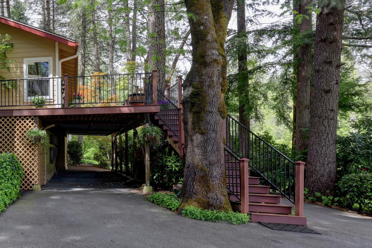 409 Live Oak Road Colfax, CA 95713 - Photo 42 of 74 Here is the extra long carport and where you access the storage, workbench space below the home.