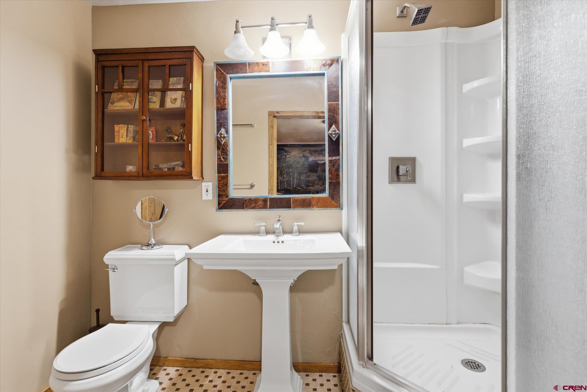 30 Stage Coach Road Bayfield, CO 81122 - Photo 24 of 43 a bathroom with a sink a toilet and shower
