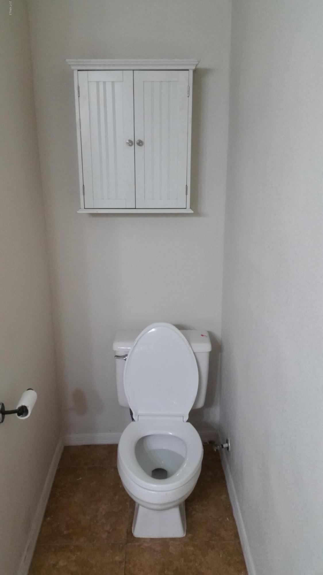 6039 South 46th Street Phoenix, AZ 85042 - Photo 12 of 16 Master Bathroom Toilet