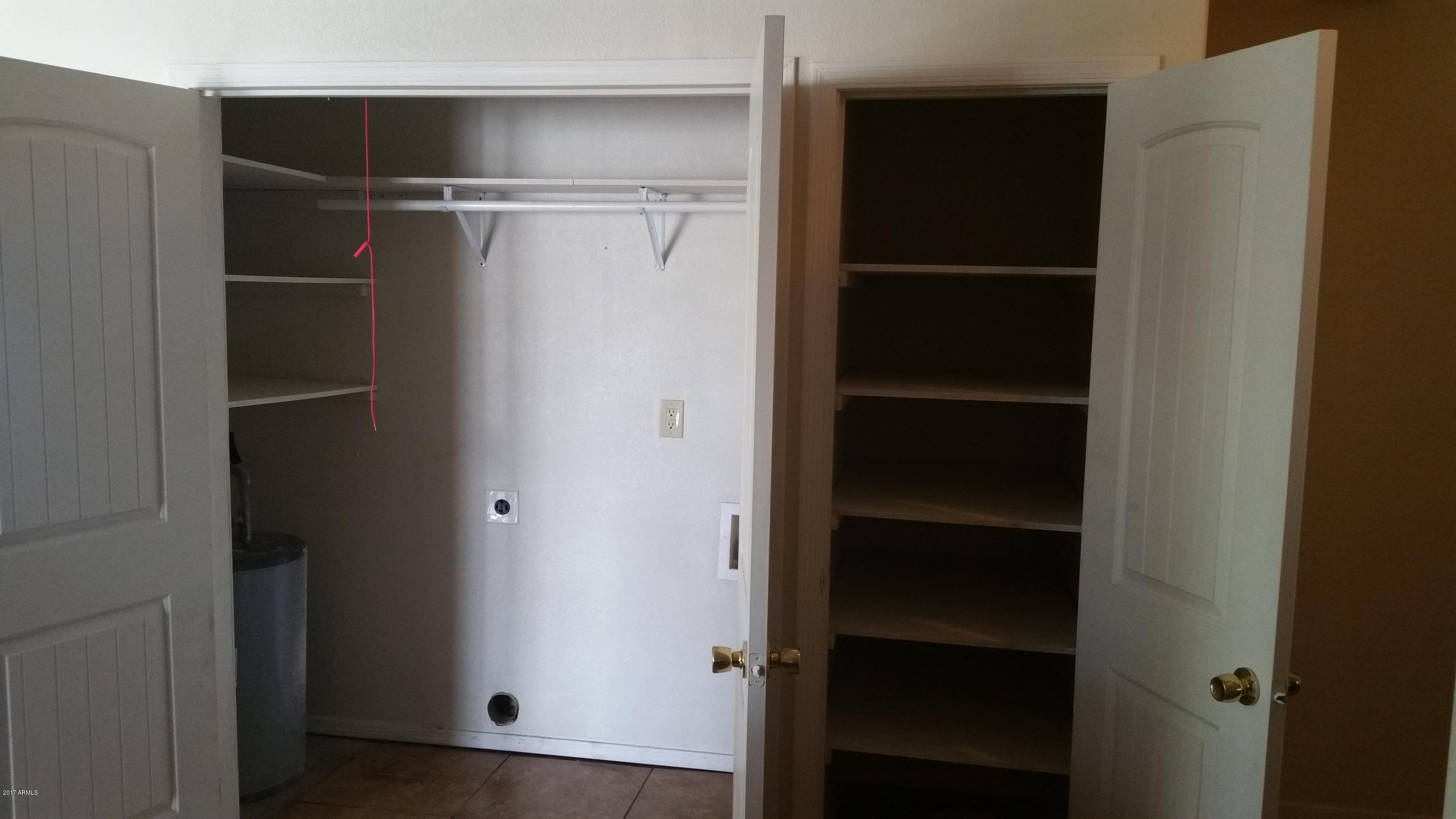 6039 South 46th Street Phoenix, AZ 85042 - Photo 8 of 16 Pantry and Laundry Closet