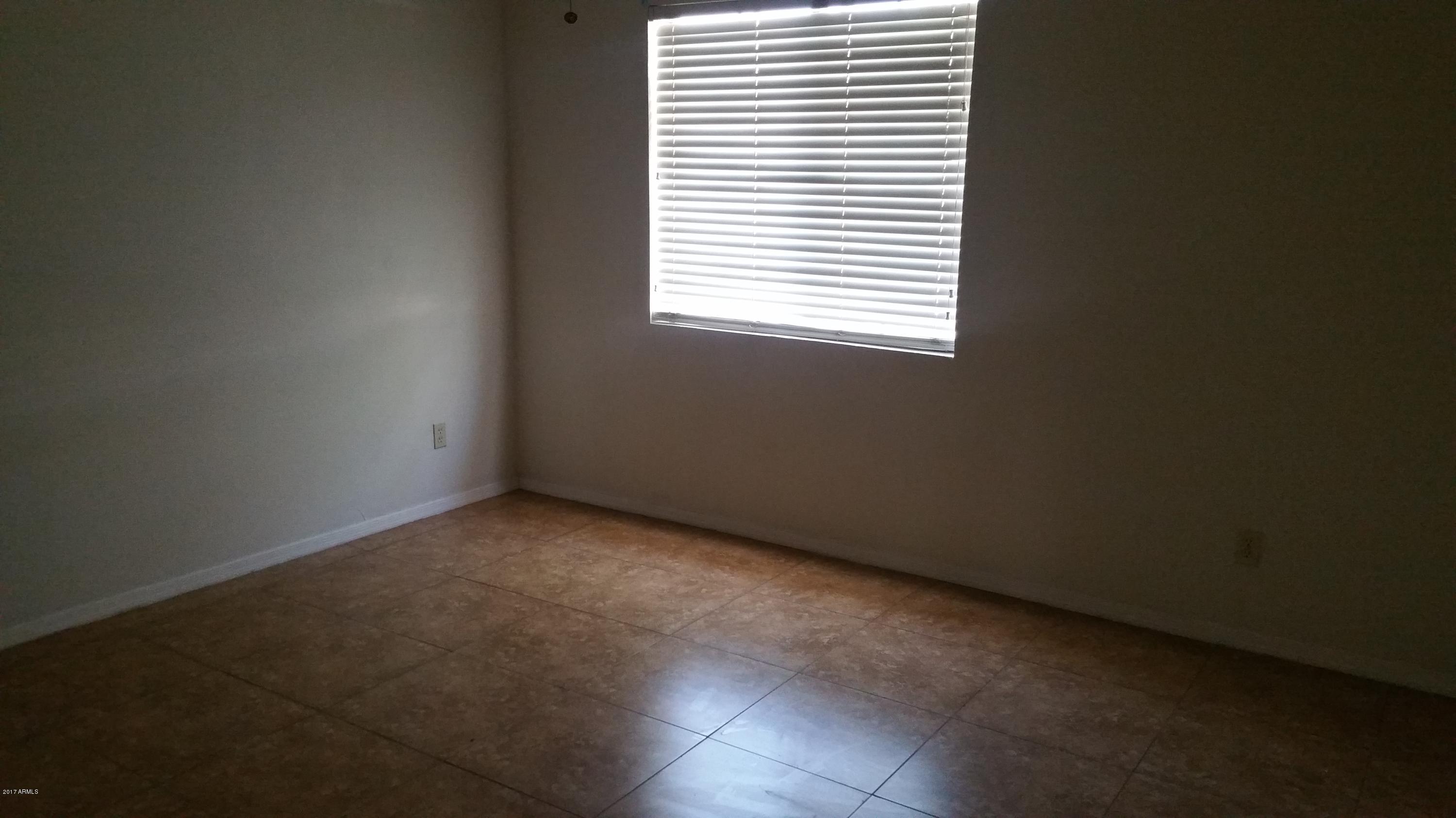 6039 South 46th Street Phoenix, AZ 85042 - Photo 10 of 16 Master Bedroom