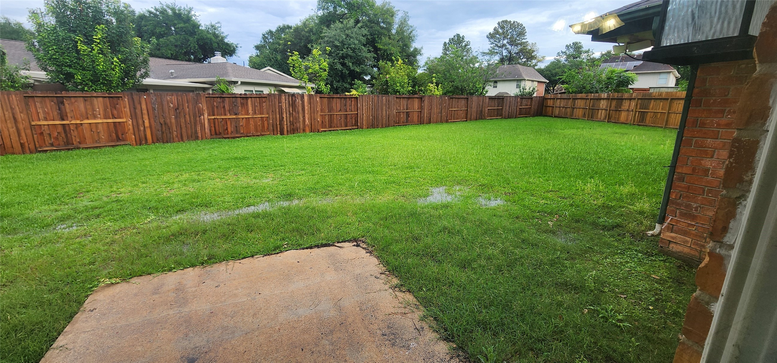 15215 Ensenada Drive Houston, TX 77083 - Photo 21 of 22 Backyard with patio, great for lazy summer BBQs