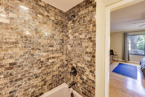 a bathroom with a shower curtain