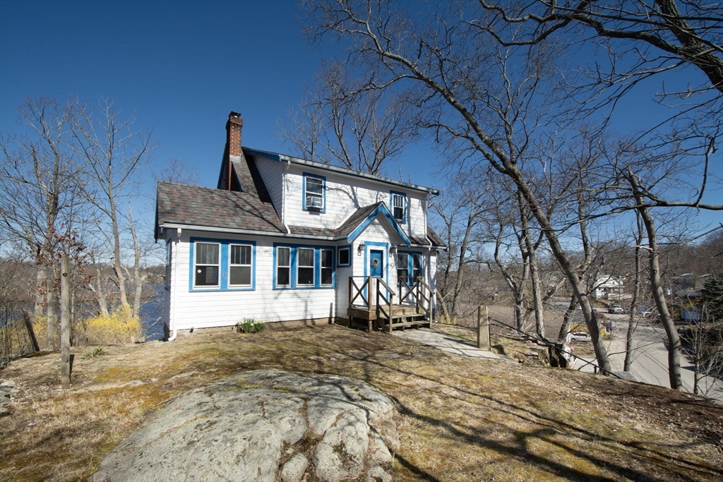 86 Westminster Road Weymouth, MA 02189 - Photo 1 of 15 a front view of a house with a yard